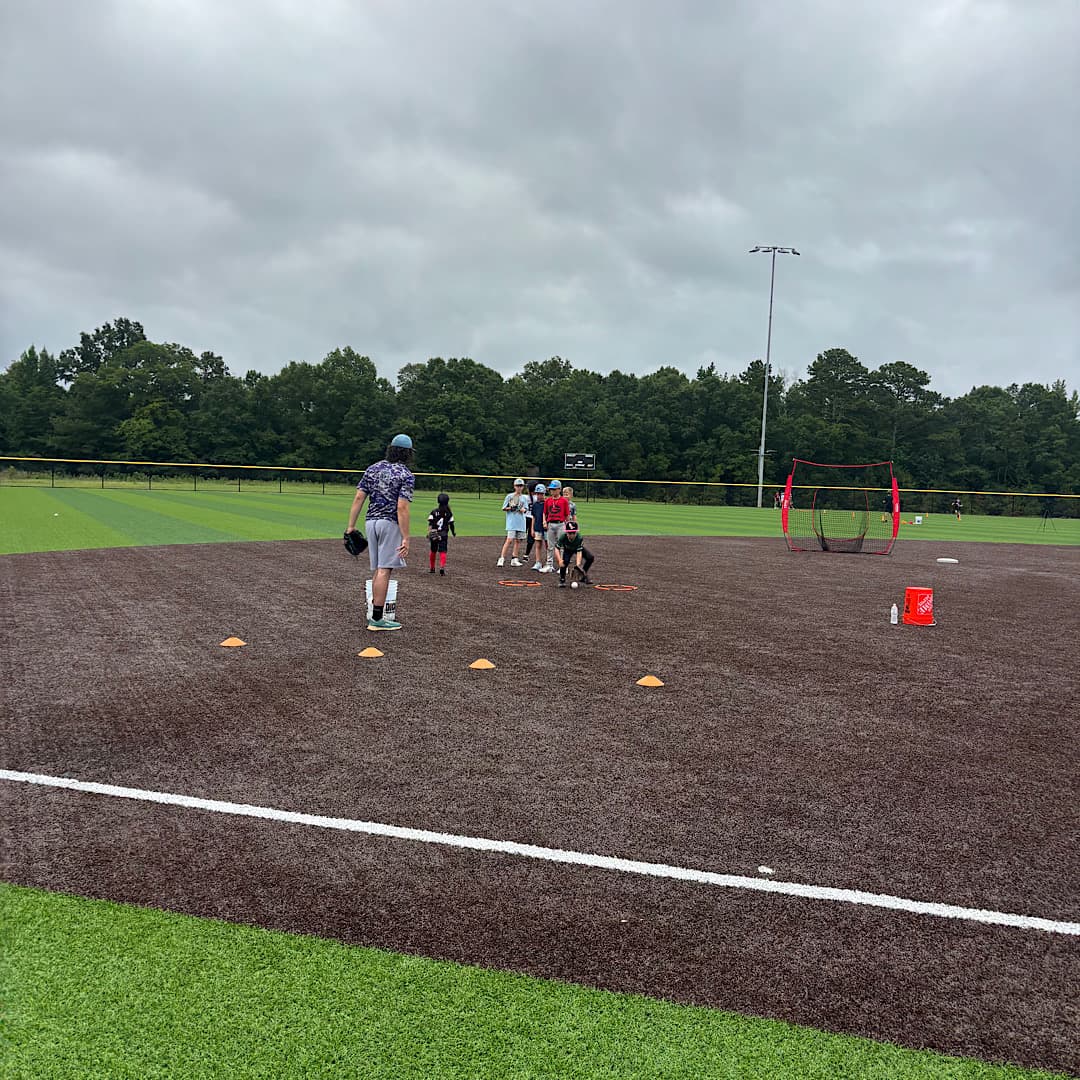 Players working on fielding at 1733 Baseball Camp